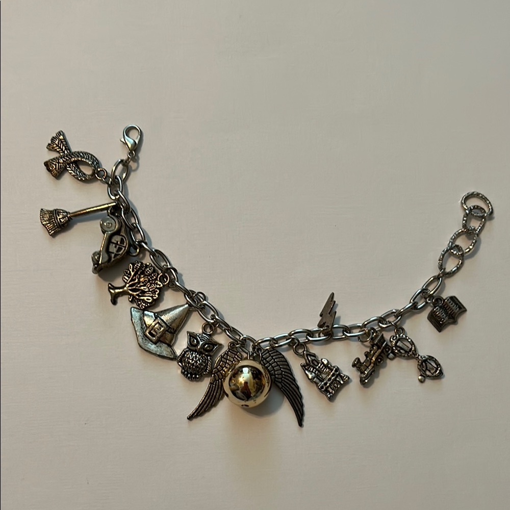 Harry Potter style charm bracelet, silver tone, not officially licensed